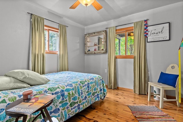 W3084 Blackbird Point Dr, Green Lake, WI 53946 - bedroom with wood-type flooring and ceiling fan