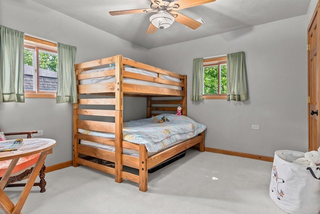 W3084 Blackbird Point Dr, Green Lake, WI 53946 - bedroom with baseboards, carpet floors, and a ceiling fan