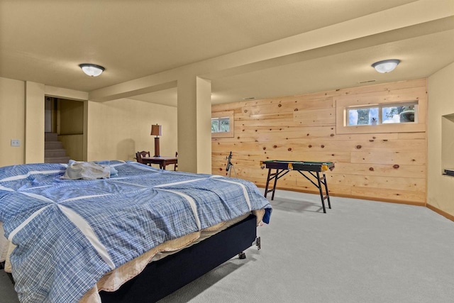 W3084 Blackbird Point Dr, Green Lake, WI 53946 - carpeted bedroom with baseboards and wooden walls