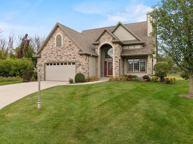 view of front facade featuring a shingled roof, concrete driveway, a front yard, a chimney, and a garage