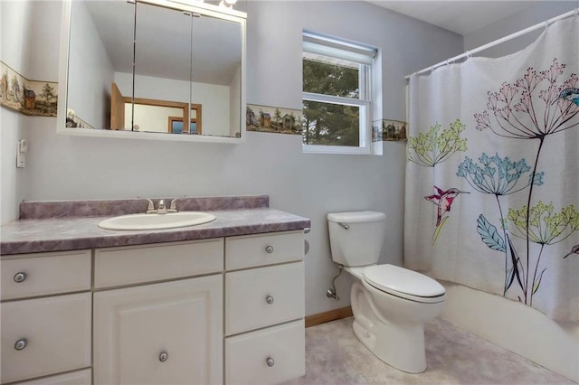 full bathroom with toilet and vanity