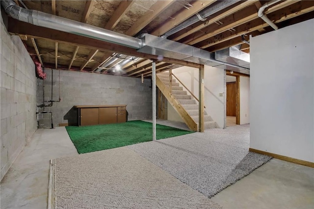 unfinished basement with stairway