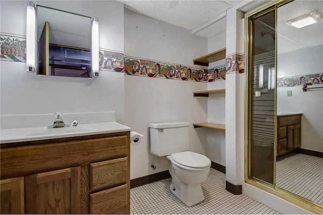 bathroom featuring visible vents, toilet, a stall shower, vanity, and tile patterned floors