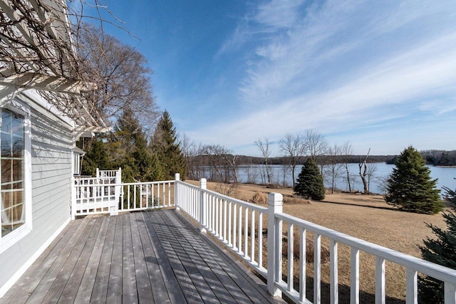 wooden deck featuring a water view