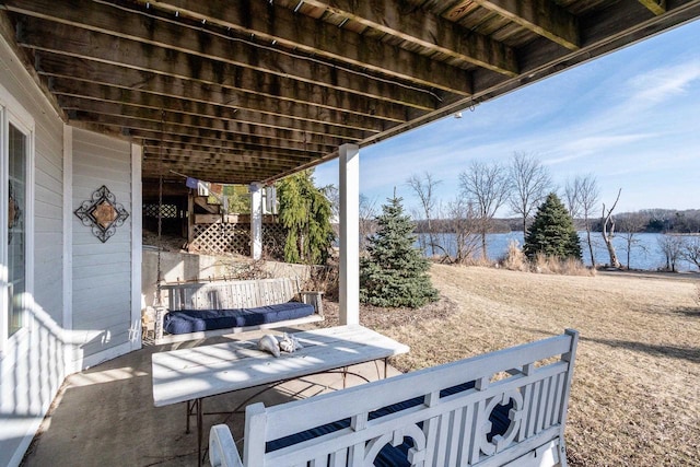 view of patio / terrace featuring a water view