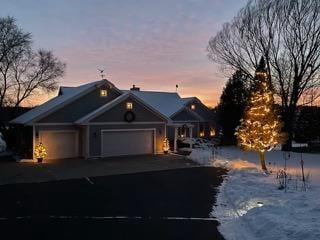 view of front of property with an attached garage and driveway