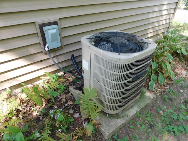 exterior details featuring cooling unit