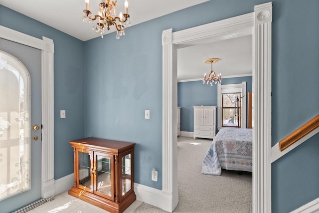 interior space featuring carpet floors, baseboards, arched walkways, and a notable chandelier