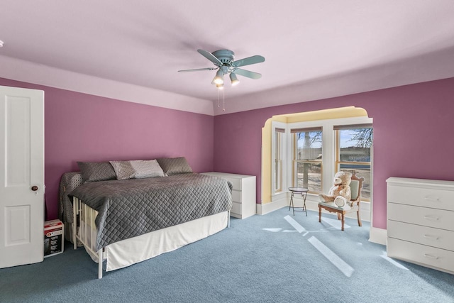 bedroom with carpet floors, baseboards, and a ceiling fan