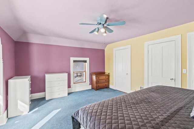 bedroom with lofted ceiling, carpet floors, ceiling fan, and baseboards