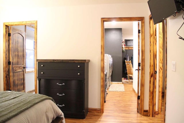 bedroom featuring light wood-style floors