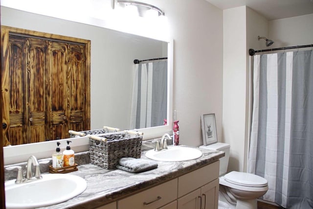 full bathroom with double vanity, a sink, toilet, and a shower with curtain