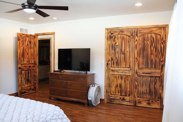 bedroom featuring ceiling fan, wood finished floors, visible vents, and recessed lighting