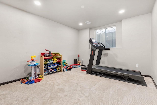 workout room featuring baseboards, carpet flooring, visible vents, and recessed lighting