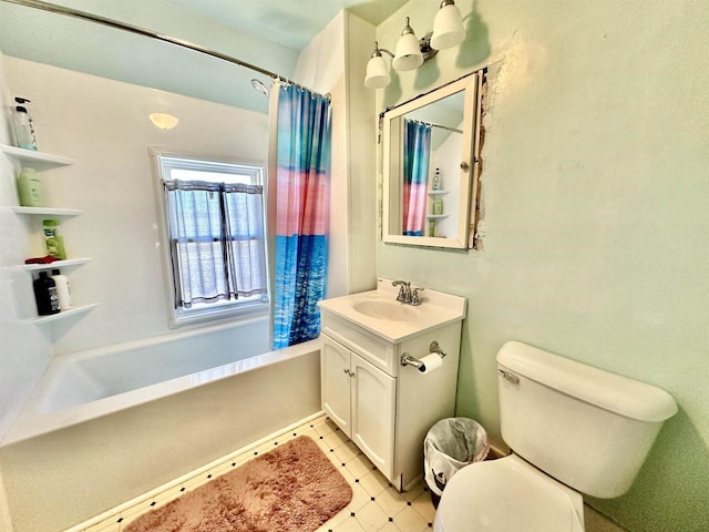 bathroom featuring a tub, curtained shower, vanity, and toilet