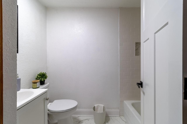 full bath with marble finish floor, toilet, vanity, and baseboards