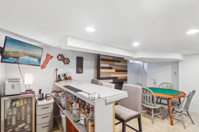 bar with recessed lighting, carpet, and a bar