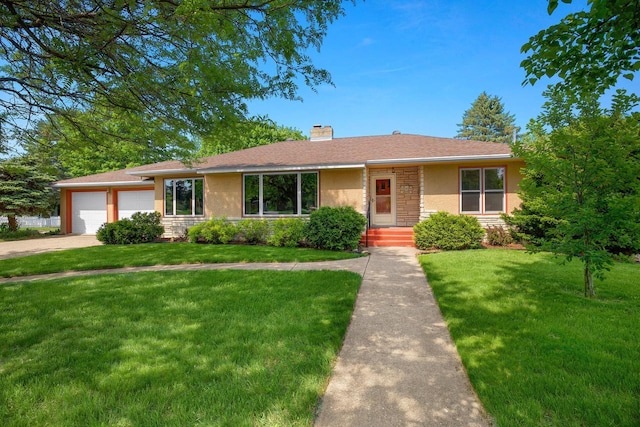 ranch-style house with a garage, a chimney, a front lawn, and stucco siding