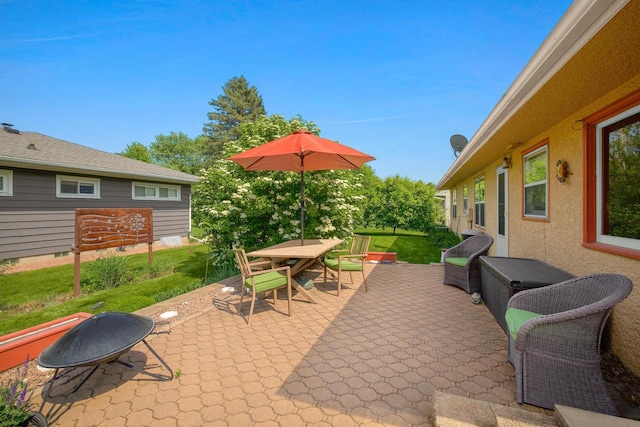 view of patio featuring outdoor dining space