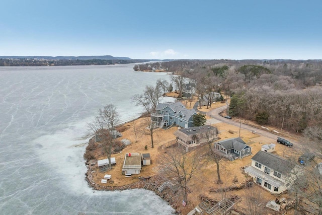 bird's eye view with a water view