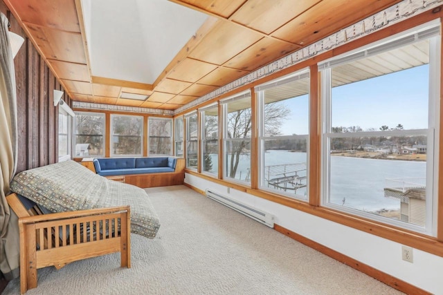 sunroom featuring wood ceiling, plenty of natural light, and baseboard heating