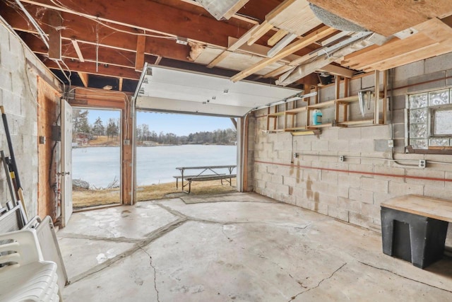 interior space featuring a garage and a healthy amount of sunlight