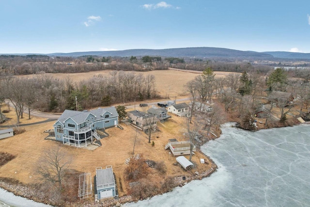 birds eye view of property featuring a rural view