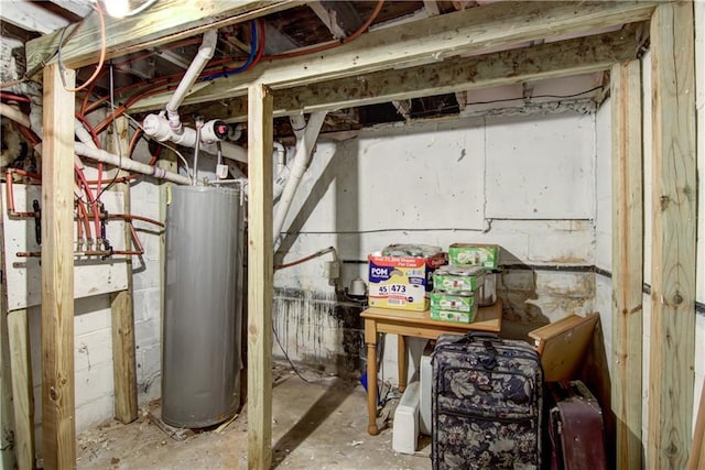 unfinished basement featuring gas water heater