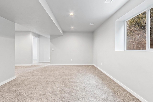 basement featuring recessed lighting, carpet flooring, and baseboards