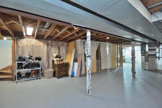 basement featuring heating unit