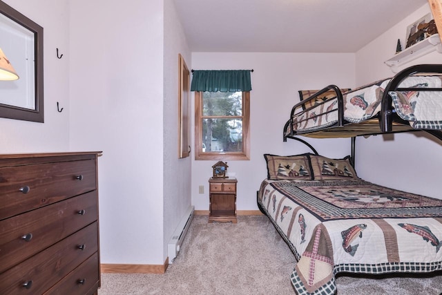 bedroom featuring baseboards, baseboard heating, and light colored carpet