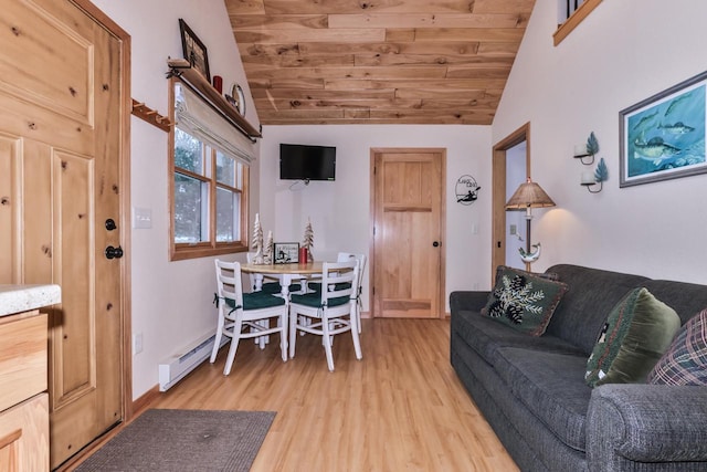 dining room with lofted ceiling, light wood finished floors, and wooden ceiling