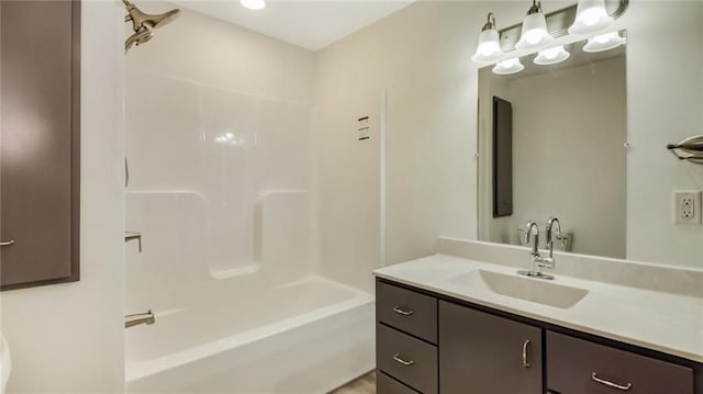 full bathroom with shower / washtub combination and vanity