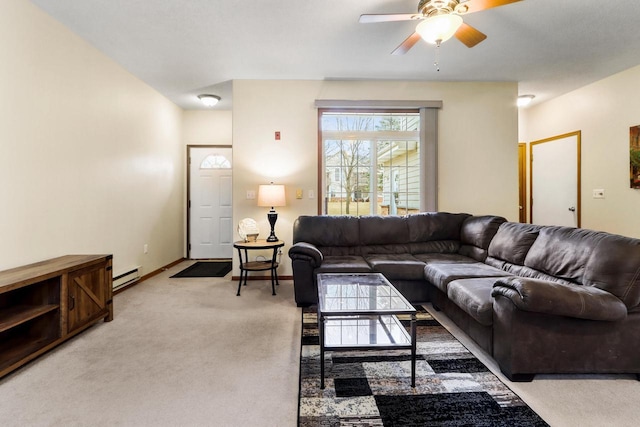 living area with light carpet, a baseboard radiator, baseboards, and a ceiling fan