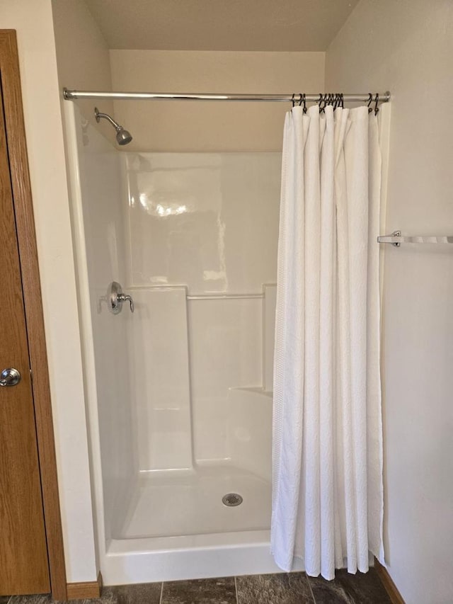 full bathroom with a shower with curtain