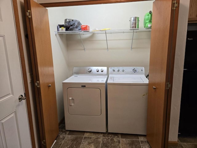 laundry area featuring washing machine and dryer and laundry area