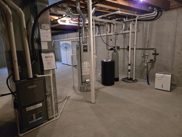 unfinished basement with water heater and heating unit