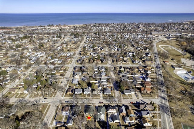 bird's eye view with a water view and a residential view