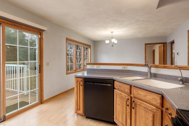 kitchen with a notable chandelier, range with electric cooktop, a sink, dishwasher, and light wood finished floors