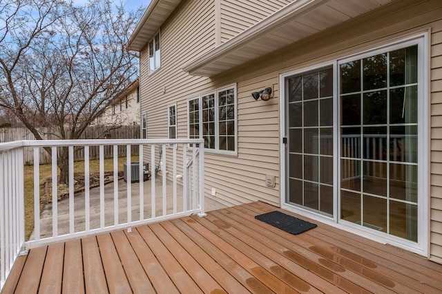 deck with cooling unit and fence