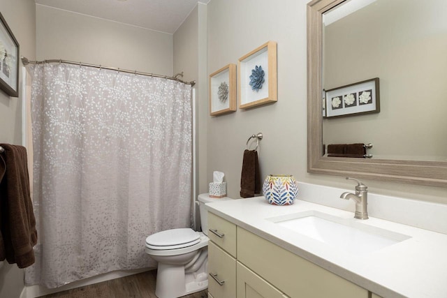 full bath featuring wood finished floors, vanity, toilet, and a shower with curtain