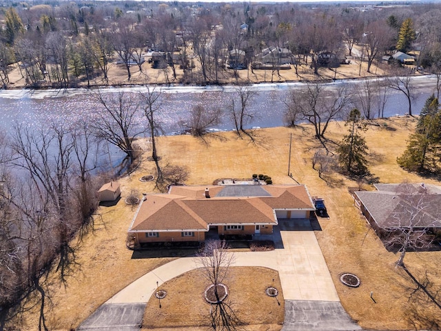 drone / aerial view with a water view