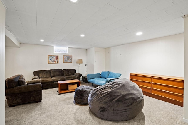 carpeted living room with recessed lighting