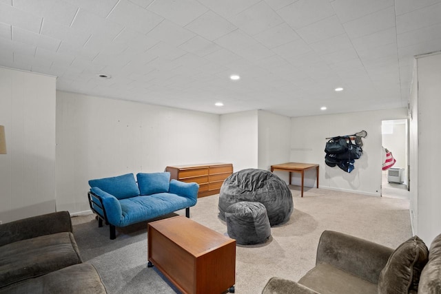 carpeted living room featuring recessed lighting and baseboards