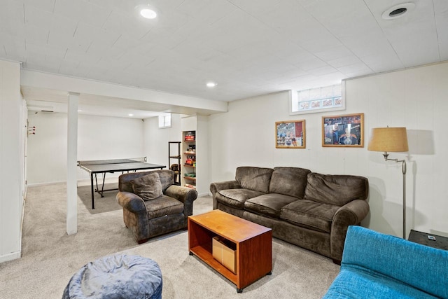 living room with recessed lighting and light colored carpet