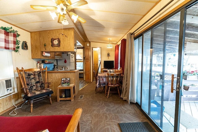 interior space featuring plenty of natural light, visible vents, and a ceiling fan