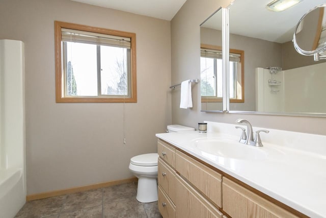 full bathroom with vanity, baseboards, a shower, tile patterned floors, and toilet