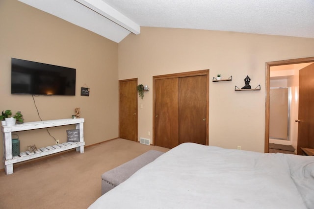 carpeted bedroom featuring lofted ceiling with beams, a textured ceiling, and visible vents