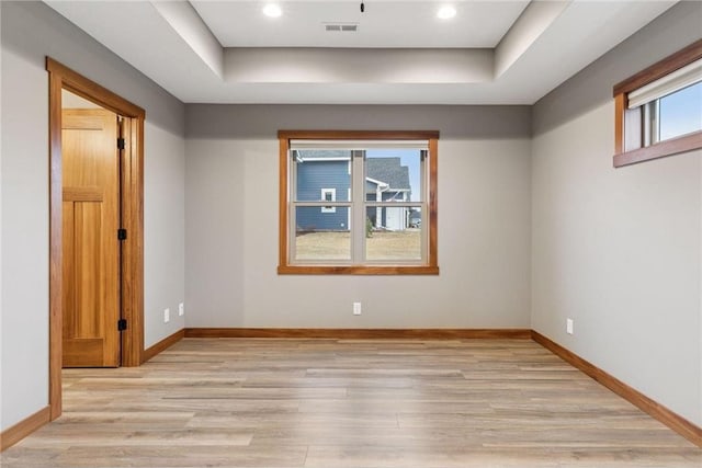 497 Westwood Dr, River Falls, WI 54022 - empty room with light wood-type flooring, baseboards, and visible vents