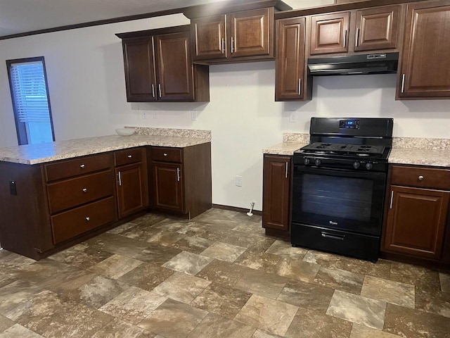 kitchen with a peninsula, black range with gas stovetop, dark brown cabinetry, and under cabinet range hood